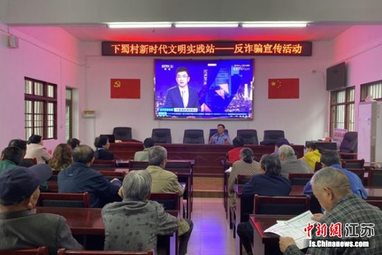 宣传活构,动现场。杨娟 摄