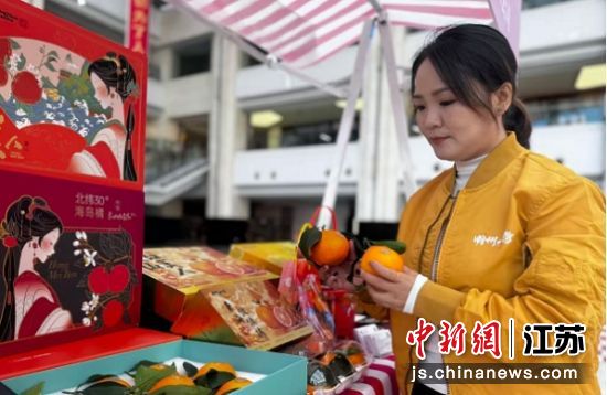 种植户展出新鲜柑橘。葛勇 摄 种植户展出新鲜柑橘。葛勇 摄